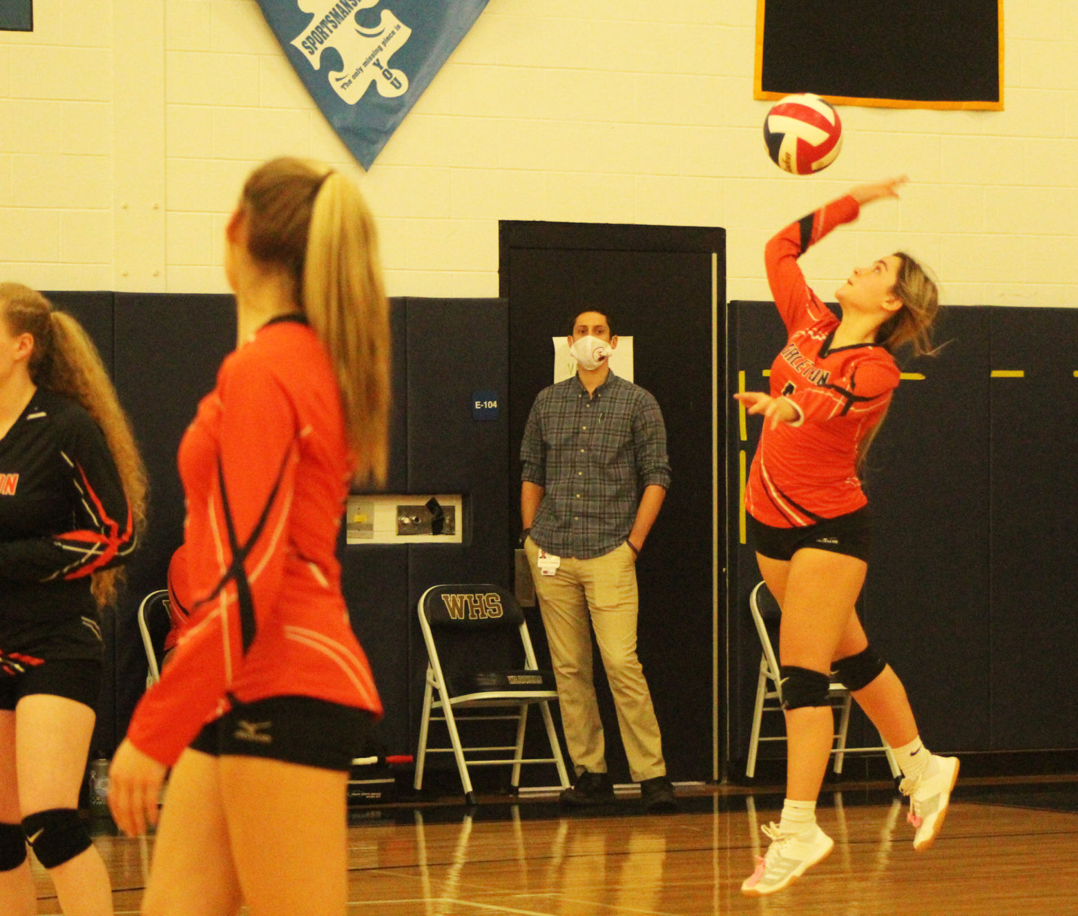 Shuemaker serves the ball